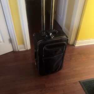 Tumi Black Rolling Travel Carry-On